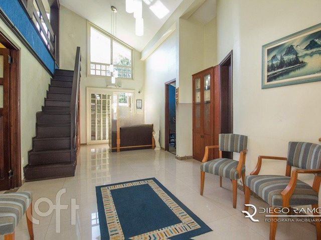 Casa com 300m², 3 dormitórios, 1 suíte, 2 vagas, Menino Deus em Porto Alegre