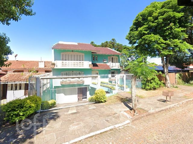 Casa com 558m², 4 dormitórios, 1 suíte, 3 vagas, Três Figueiras em Porto Alegre