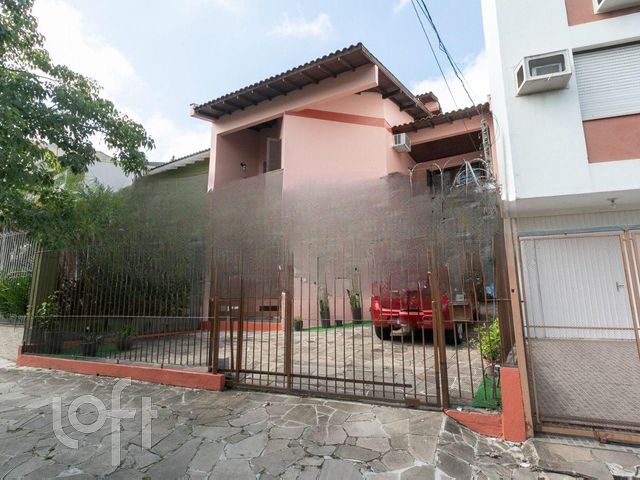 Casa com 294m², 4 dormitórios, 1 suíte, 2 vagas, Cristo Redentor em Porto Alegre