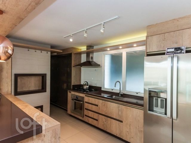 Apartamento com 197m², 3 dormitórios, 3 suítes, 4 vagas, Rio Branco em Porto Alegre