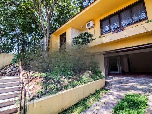 Casa com 222m², 3 dormitórios, 1 suíte, 4 vagas, Chácara das Pedras em Porto Alegre