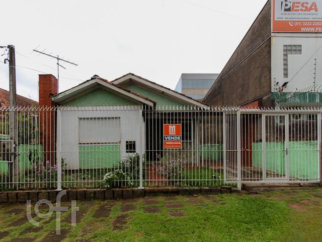 Casa com 80m², 2 dormitórios, 2 vagas no bairro Marechal Rondon em Canoas para Comprar