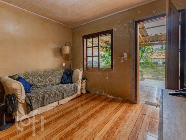 Casa com 69m², 3 dormitórios no bairro Mathias Velho em Canoas para Comprar