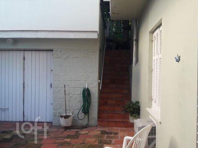 Casa com 300m², 3 dormitórios, 3 vagas, Menino Deus em Porto Alegre