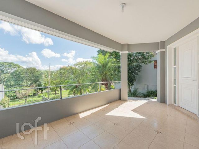 Casa com 208m², 4 dormitórios, 2 suítes, 2 vagas, Chácara das Pedras em Porto Alegre
