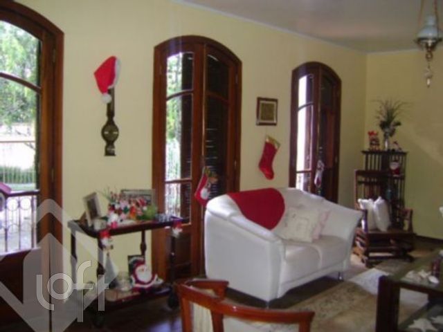 Casa com 372m², 4 dormitórios, 2 suítes, 4 vagas, Chácara das Pedras em Porto Alegre