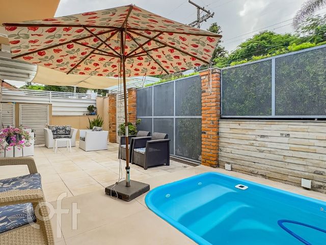 Casa com 357m², 4 dormitórios, 3 suítes, 3 vagas, Chácara das Pedras em Porto Alegre