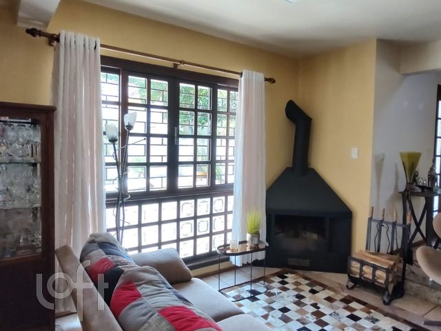 Casa com 266m², 3 dormitórios, 1 suíte, 1 vaga, Jardim Botânico em Porto Alegre