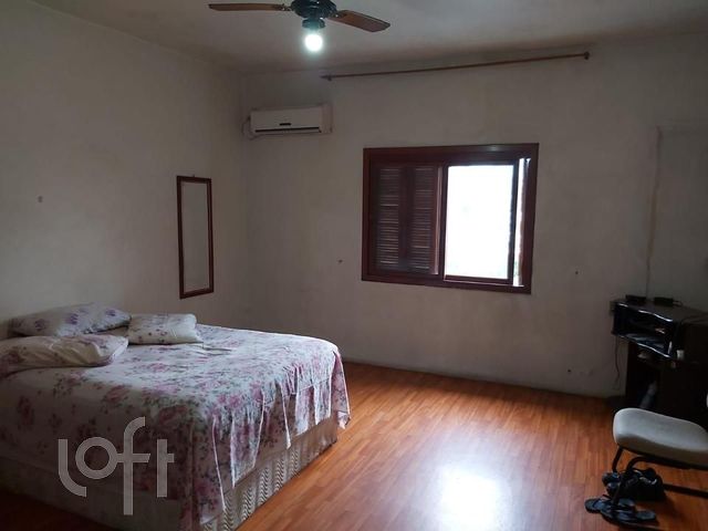 Casa com 434m², 4 dormitórios, 1 suíte, 2 vagas, Chácara das Pedras em Porto Alegre