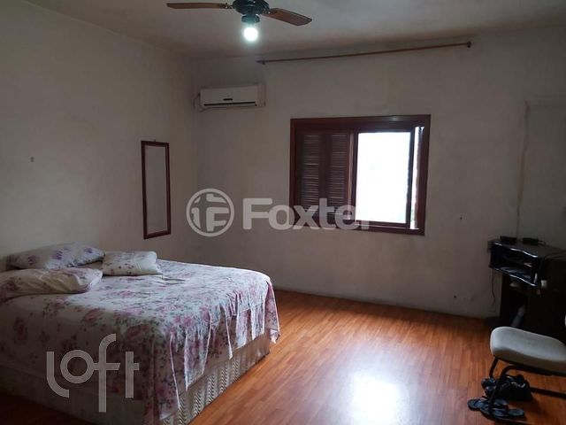 Casa com 434m², 4 dormitórios, 1 suíte, 2 vagas, Chácara das Pedras em Porto Alegre