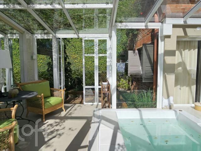 Casa com 400m², 3 dormitórios, 3 suítes, 5 vagas, Chácara das Pedras em Porto Alegre