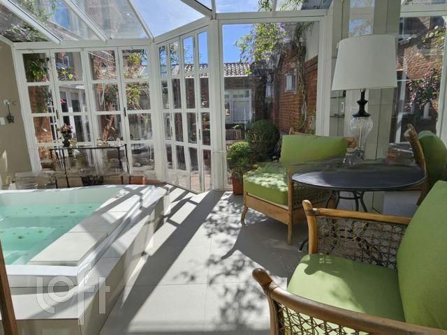 Casa com 400m², 3 dormitórios, 3 suítes, 5 vagas, Chácara das Pedras em Porto Alegre