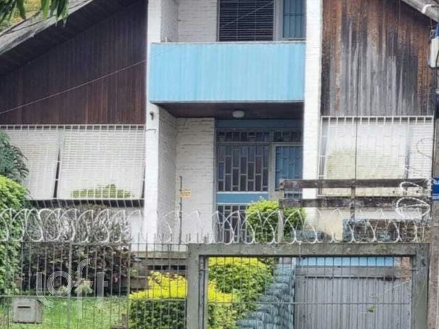 Casa com 440m², 3 dormitórios, 1 suíte, 3 vagas, Jardim Botânico em Porto Alegre