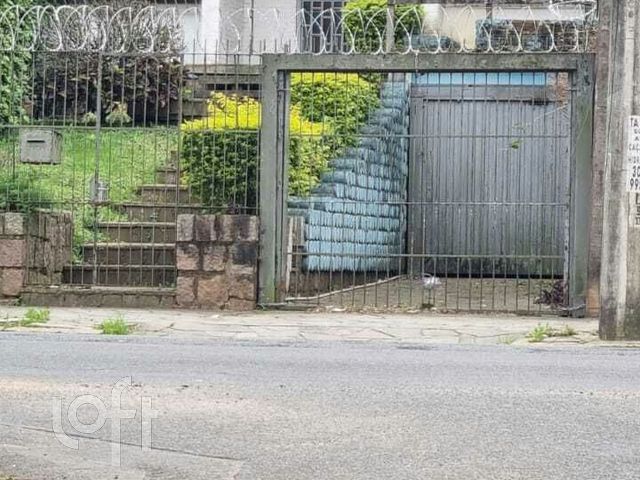 Casa com 440m², 3 dormitórios, 1 suíte, 3 vagas, Jardim Botânico em Porto Alegre