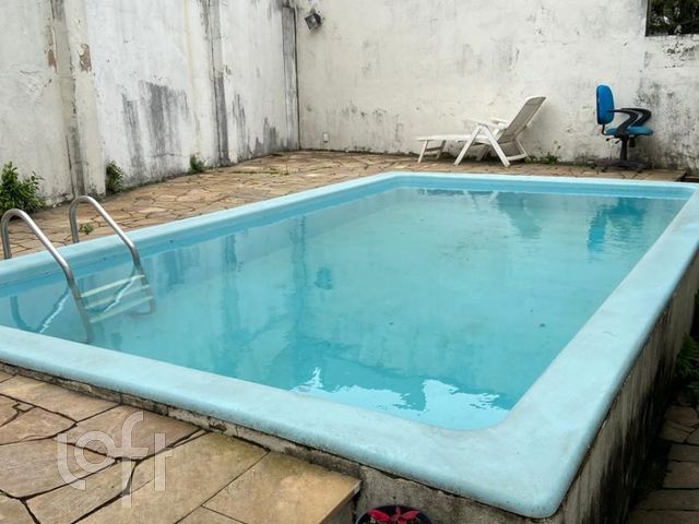 Casa com 235m², 3 dormitórios, 1 suíte, 2 vagas, Chácara das Pedras em Porto Alegre