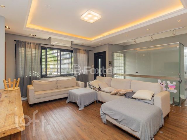 Casa com 252m², 3 dormitórios, 3 suítes, 2 vagas, Chácara das Pedras em Porto Alegre