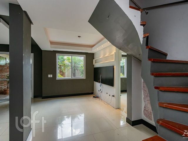 Casa com 156m², 3 dormitórios, 1 suíte, 2 vagas no bairro Marechal Rondon em Canoas para Comprar