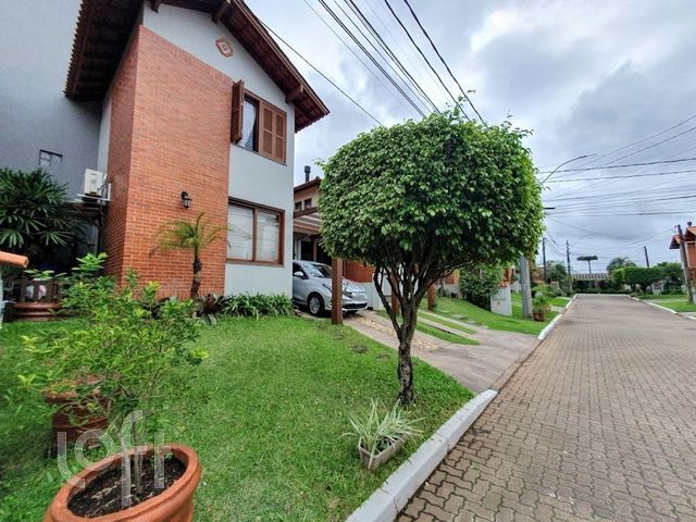 Casa com 117m², 3 dormitórios, 1 suíte, 3 vagas no bairro Igará em Canoas para Comprar