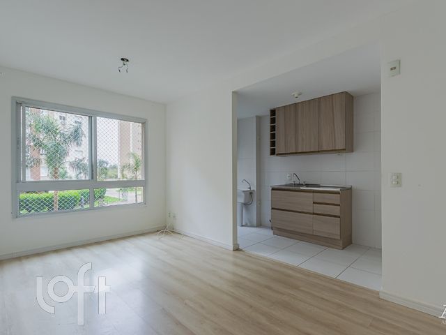 Apartamento com 60m², 2 dormitórios, 1 suíte, 1 vaga no bairro Marechal Rondon em Canoas para Comprar