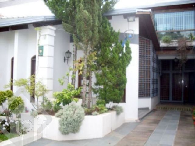 Casa com 298m², 3 dormitórios, 1 suíte, 3 vagas, Cristo Redentor em Porto Alegre