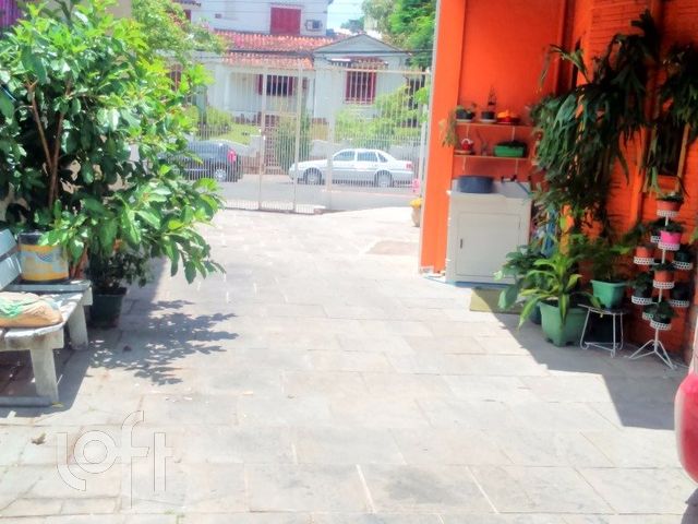 Casa com 108m², 2 dormitórios, 1 suíte, 5 vagas, Menino Deus em Porto Alegre