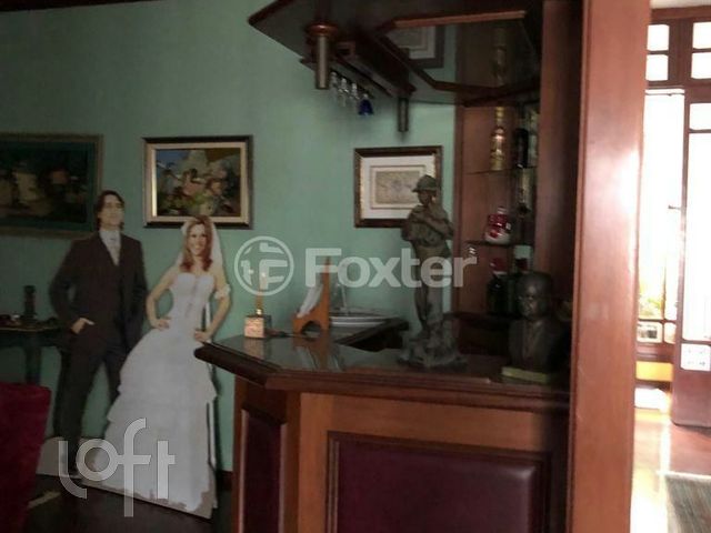 Casa com 345m², 3 dormitórios, 1 suíte, 4 vagas, Chácara das Pedras em Porto Alegre