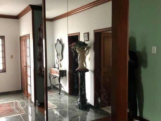 Casa com 345m², 3 dormitórios, 1 suíte, 4 vagas, Chácara das Pedras em Porto Alegre