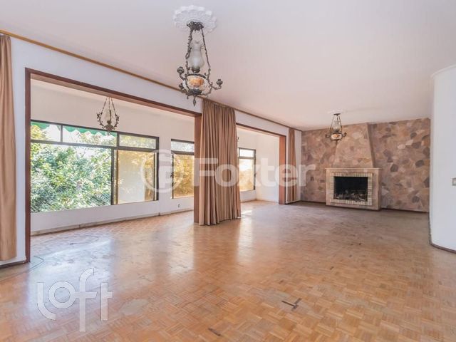 Casa com 502m², 4 dormitórios, 1 suíte, 5 vagas, Chácara das Pedras em Porto Alegre