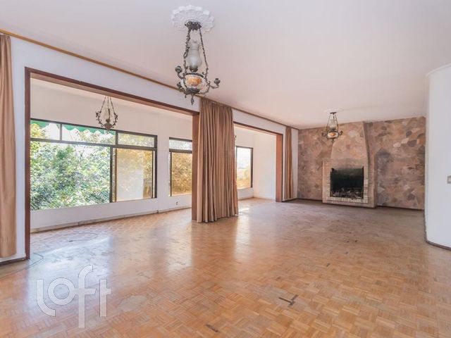 Casa com 502m², 4 dormitórios, 1 suíte, 5 vagas, Chácara das Pedras em Porto Alegre