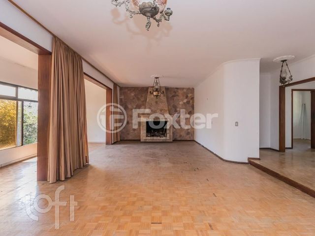 Casa com 502m², 4 dormitórios, 1 suíte, 5 vagas, Chácara das Pedras em Porto Alegre