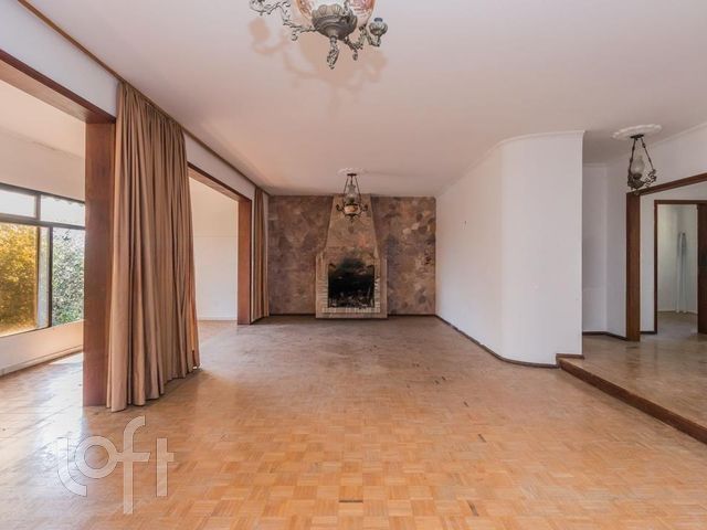 Casa com 502m², 4 dormitórios, 1 suíte, 5 vagas, Chácara das Pedras em Porto Alegre