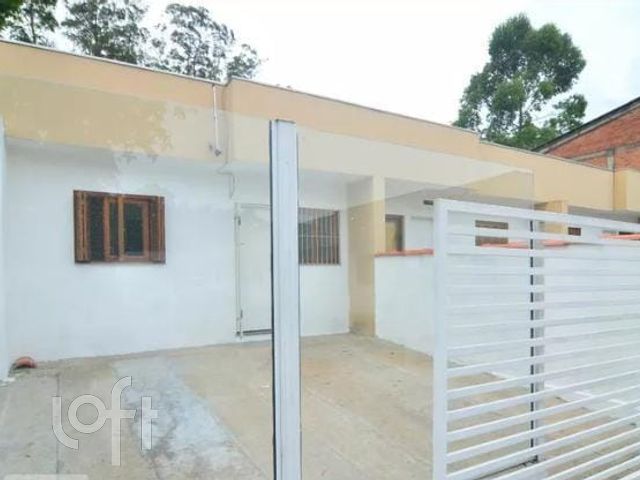 Casa com 43m², 2 dormitórios, 1 vaga no bairro Guajuviras em Canoas para Comprar