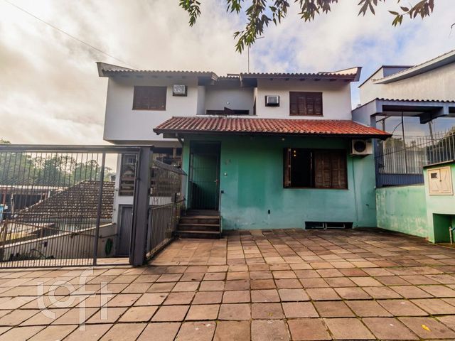 Casa com 335m², 5 dormitórios, 2 suítes, 4 vagas, Chácara das Pedras em Porto Alegre