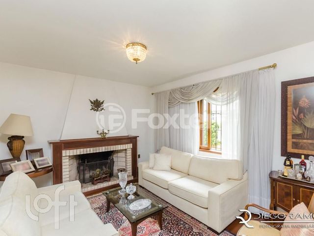 Casa com 322m², 3 dormitórios, 3 suítes, 4 vagas, Chácara das Pedras em Porto Alegre