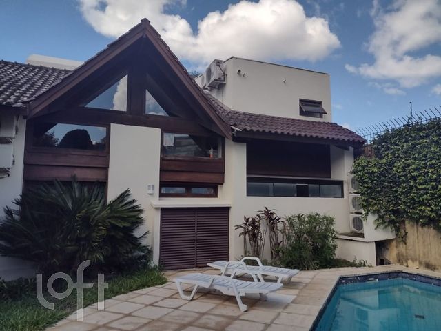 Casa em Condomínio com 343m², 4 dormitórios, 4 suítes, 2 vagas, Jardim Botânico em Porto Alegre