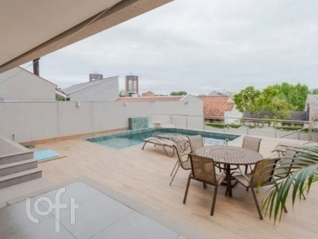 Casa com 447m², 4 dormitórios, 3 suítes, 4 vagas, Chácara das Pedras em Porto Alegre
