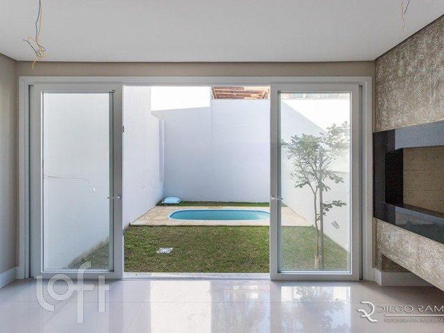 Casa com 281m², 3 dormitórios, 3 suítes, 5 vagas, Chácara das Pedras em Porto Alegre