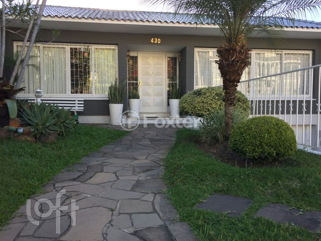 Casa com 392m², 5 dormitórios, 2 suítes, 5 vagas, Chácara das Pedras em Porto Alegre