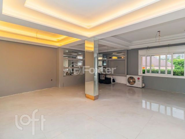 Casa com 370m², 3 dormitórios, 2 suítes, 2 vagas, Chácara das Pedras em Porto Alegre
