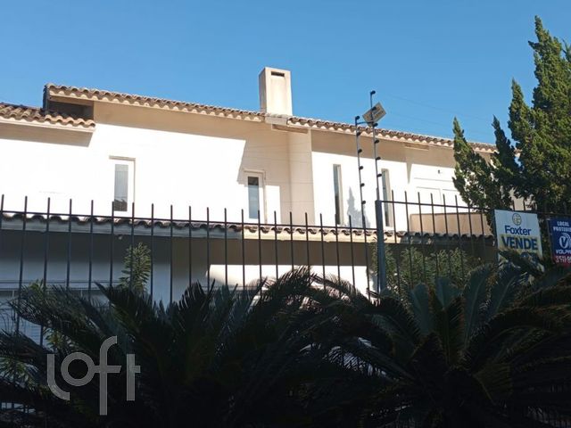 Casa com 387m², 3 dormitórios, 2 suítes, 2 vagas, Chácara das Pedras em Porto Alegre