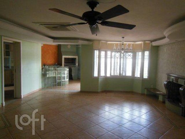 Casa com 340m², 3 dormitórios, 1 suíte, 6 vagas, Cristo Redentor em Porto Alegre