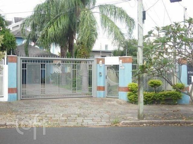 Casa com 340m², 3 dormitórios, 1 suíte, 6 vagas, Cristo Redentor em Porto Alegre
