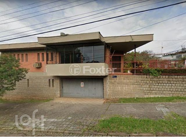 Casa com 408m², 5 dormitórios, 3 suítes, 4 vagas, Chácara das Pedras em Porto Alegre