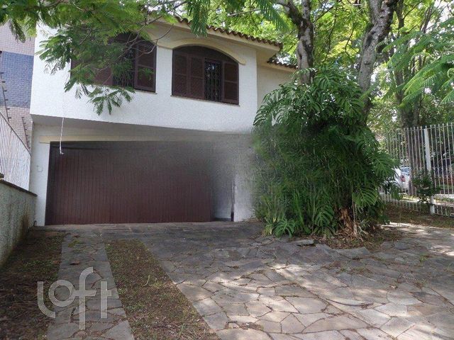 Casa com 238m², 3 dormitórios, 1 suíte, 4 vagas, Chácara das Pedras em Porto Alegre