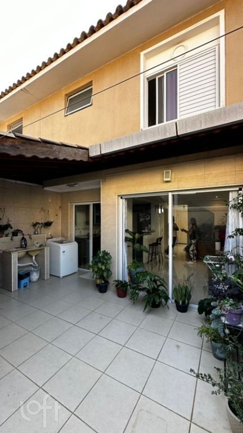 Casa à venda com 3 quartos, 100m² - Foto 1