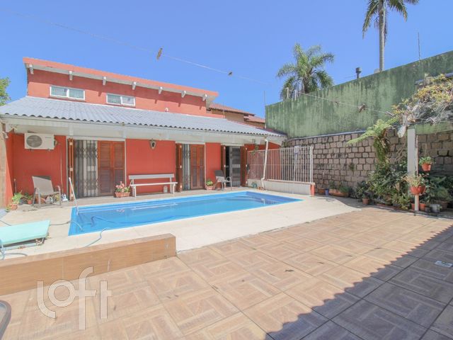 Casa com 344m², 3 dormitórios, 1 suíte, 4 vagas, Chácara das Pedras em Porto Alegre