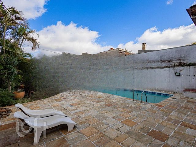 Casa com 396m², 4 dormitórios, 2 suítes, 5 vagas, Chácara das Pedras em Porto Alegre