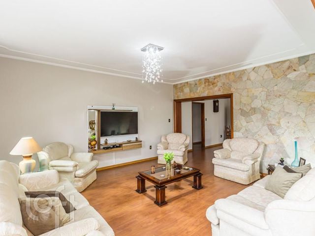 Casa com 263m², 4 dormitórios, 1 suíte, 4 vagas, Cristo Redentor em Porto Alegre