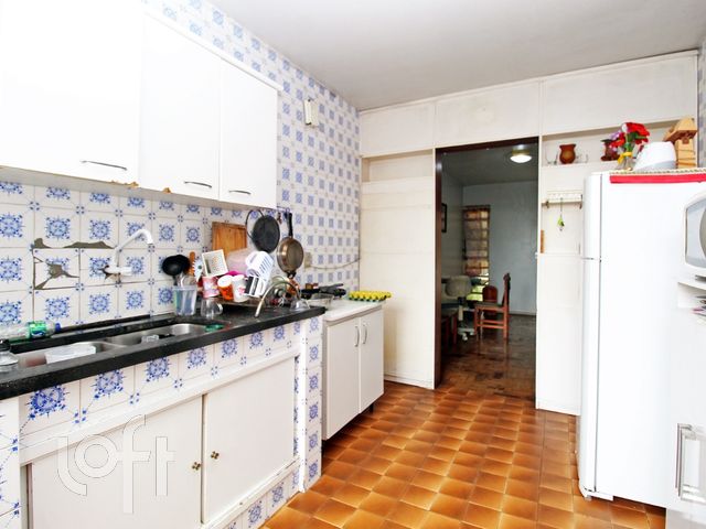 Casa com 450m², 5 dormitórios, 1 suíte, 6 vagas, Menino Deus em Porto Alegre