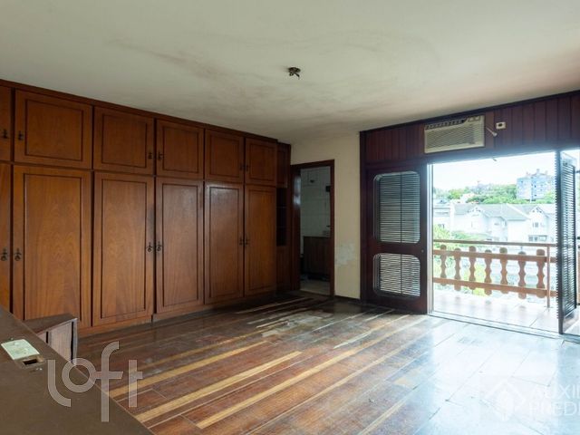 Casa com 294m², 3 dormitórios, 1 suíte, 3 vagas, Chácara das Pedras em Porto Alegre